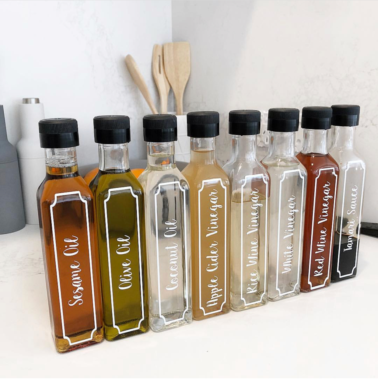 labelled oil and vinegar bottles